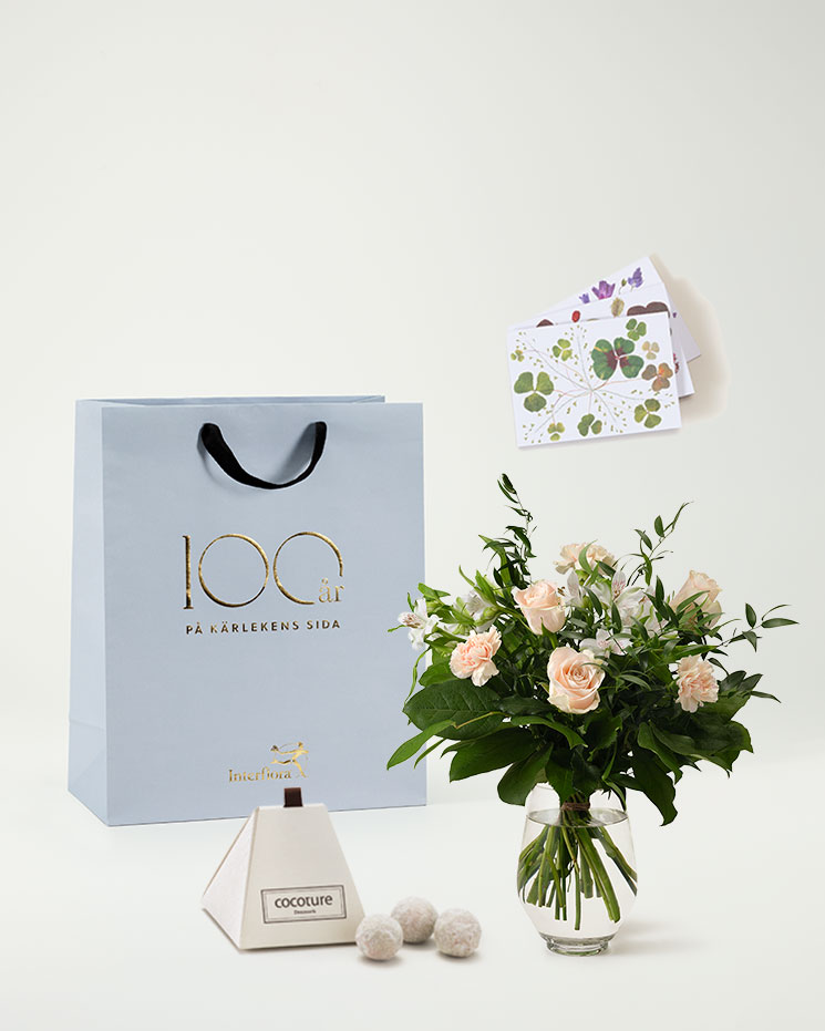 interflora skicka blommor Åkersberga skicka blommor i kasse som är enkelt att beställa för att önska "krya på dig"